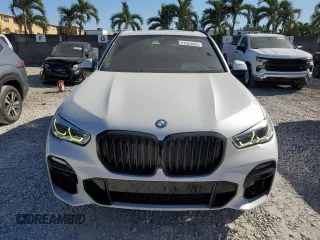 2019 BMW X5 xDrive40i with VIN 5UXCR6C50KLK86199, listed as a Copart auction lot 47523305 with 76,924 mi miles and Salvage Title. Bid and sale history available at DreamBid. Image 5.