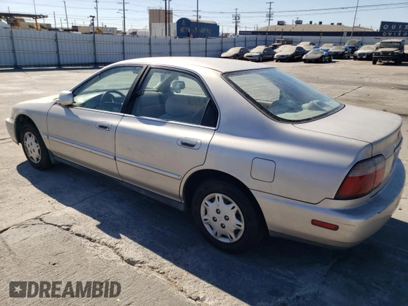 1996 Honda Accord Value with VIN 1HGCD5691TA249900, listed as a Copart auction lot 77683144 with 155,178 mi miles and Salvage Title. Bid and sale history available at DreamBid. Image 2.