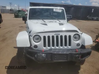 2017 Jeep Wrangler Unlimited Rubicon z VIN 1C4BJWFG1HL578230, wystawiony jako Copart lot #59957075 z przebiegiem 59 701 mil mil oraz Szkoda całkowita • Salvage title. Historia ofert i sprzedaży dostępna na DreamBid. Obrazek 5.