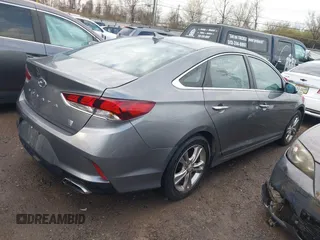 2019 Hyundai Sonata SEL with VIN 5NPE34AF4KH784387, listed as a IAAI auction lot 41882760 with 74,336 mi miles and . Bid and sale history available at DreamBid. Image 4.