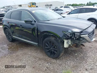 2018 Mazda CX-9 Grand Touring with VIN JM3TCADY3J0228643, listed as a IAAI auction lot 42481641 with 121,714 mi miles and . Bid and sale history available at DreamBid. Image 1.