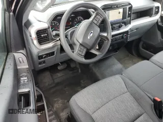 2023 Ford F-150 XL with VIN 1FTMF1CB3PKF58099, listed as a Copart auction lot 61974605 with 12,193 mi miles and Non repairable. Bid and sale history available at DreamBid. Image 8.