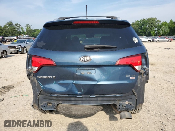 2014 Kia Sorento EX with VIN 5XYKU4A70EG528302, listed as a Copart auction lot 61824965 with 144,897 mi miles and Salvage title. Bid and sale history available at DreamBid. Image 6.