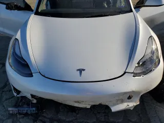 2023 Tesla Model 3 Performance z VIN 5YJ3E1EC3PF556807, wystawiony jako Copart lot #46990175 z przebiegiem Nie podano mil oraz Nie do naprawy • Non repairable. Historia ofert i sprzedaży dostępna na DreamBid. Obrazek 12.