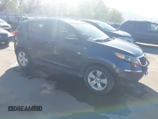 2012 Kia Sportage LX with VIN KNDPBCA28C7273676, listed as a IAAI auction lot 42034764 with 121,527 mi miles and . Bid and sale history available at DreamBid. Image 1.