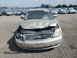 2006 Ford Five Hundred SE с VIN 1FAFP23146G150401, выставлен на аукционе Copart как лот 57000605 с пробегом 218 689 миль миль и Списание • Salvage title. История ставок и продаж доступна на DreamBid. Изображение 5.