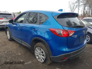 2013 Mazda CX-5 Touring with VIN JM3KE4CE0D0160711, listed as a IAAI auction lot 41843658 with 65,391 mi miles. Bid and sale history available at carsss.com. Image 3.