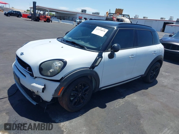 2015 MINI Countryman S with VIN WMWZC3C58FWT05613, listed as a IAAI auction lot 42374870 with 124,214 mi miles and . Bid and sale history available at DreamBid. Image 13.