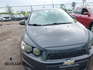 2014 Chevrolet Sonic LT with VIN 1G1JC5SH8E4235864, listed as a IAAI auction lot 42247217 with 150,057 mi miles and . Bid and sale history available at DreamBid. Image 6.