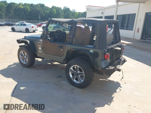 2002 Jeep Wrangler Sport with VIN 1J4FA49S52P760173, listed as a IAAI auction lot 42468550 with 201,682 mi miles and . Bid and sale history available at DreamBid. Image 3.