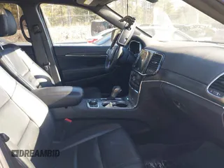 2021 Jeep Grand Cherokee 80th Anniversary z VIN 1C4RJFBG0MC730058, wystawiony jako IAAI lot #41263939 z przebiegiem 34 659 mil mil oraz . Historia ofert i sprzedaży dostępna na DreamBid. Obrazek 5.