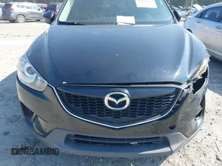2014 Mazda CX-5 Sport z VIN JM3KE2BE2E0325715, wystawiony jako IAAI lot #42683243 z przebiegiem 262 005 mil mil oraz . Historia ofert i sprzedaży dostępna na DreamBid. Obrazek 12.