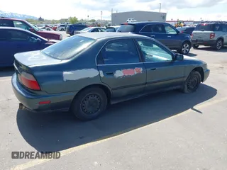1997 Honda Accord LX with VIN JHMCD5639VC020185, listed as a IAAI auction lot 42072191 with 263,967 mi miles and . Bid and sale history available at carsss.com. Image 4.