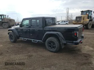 2022 Jeep Gladiator Rubicon with VIN 1C6JJTBG6NL118998, listed as a Copart auction lot 81451814 with 61,125 mi miles and Salvage title. Bid and sale history available at DreamBid. Image 2.