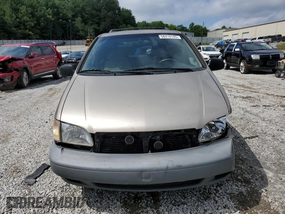 2000 Toyota Sienna LE z VIN 4T3ZF13C7YU259075, wystawiony jako Copart lot #58416105 z przebiegiem 235 788 mil mil oraz Szkoda całkowita • Salvage title. Historia ofert i sprzedaży dostępna na DreamBid. Obrazek 5.