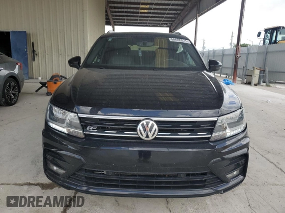2021 Volkswagen Tiguan SE with VIN 3VV3B7AX4MM095257, listed as a Copart auction lot 60690015 with 61,782 mi miles and Salvage title. Bid and sale history available at DreamBid. Image 5.