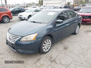 2015 Nissan Sentra S with VIN 3N1AB7APXFY277095, listed as a IAAI auction lot 42040176 with 188,763 mi miles. Bid and sale history available at carsss.com. Image 2.