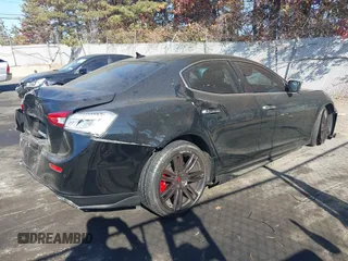 2014 Maserati Ghibli S Q4 z VIN ZAM57RTA9E1106695, wystawiony jako IAAI lot #40783416 z przebiegiem 92 885 mil mil oraz . Historia ofert i sprzedaży dostępna na DreamBid. Obrazek 4.