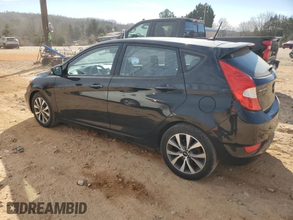 2015 Hyundai Accent Sport with VIN KMHCU5AE9FU233087, listed as a Copart auction lot 43356795 with 107,140 mi miles and Clean Title. Bid and sale history available at carsss.com. Image 2.