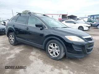 2011 Mazda CX-9 Touring with VIN JM3TB2CA3B0319068, listed as a IAAI auction lot 41731470 with 111,273 mi miles and . Bid and sale history available at DreamBid. Image 1.