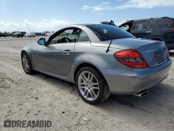 2009 Mercedes-Benz SLK-Class 3.0L with VIN WDBWK54F69F195983, listed as a Copart auction lot 75302124 with 0 mi miles and Salvage Title. Bid and sale history available at carsss.com. Image 2.