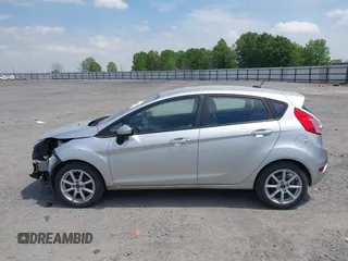 2019 Ford Fiesta SE z VIN 3FADP4EJ9KM107124, wystawiony jako IAAI lot #42067464 z przebiegiem 89 076 mil mil oraz . Historia ofert i sprzedaży dostępna na DreamBid. Obrazek 15.