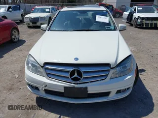 2011 Mercedes-Benz C with VIN WDDGF8BBXBR174317, listed as a IAAI auction lot 42116532 with 121,227 mi miles. Bid and sale history available at carsss.com. Image 6.