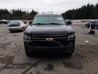 2010 Chevrolet Suburban LS z VIN 1GNUKHE3XAR192464, wystawiony jako Copart lot #87311324 z przebiegiem Nie podano mil oraz Szkoda całkowita • Salvage title. Historia ofert i sprzedaży dostępna na DreamBid. Obrazek 11.