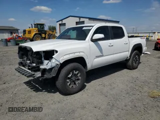 2021 Toyota Tacoma SR with VIN 3TMCZ5AN2MM389060, listed as a Copart auction lot 59306565 with 5,868 mi miles and Salvage title. Bid and sale history available at DreamBid. Image 1.