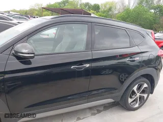 2017 Hyundai Tucson Value with VIN KM8J33A26HU362363, listed as a IAAI auction lot 41940376 with 127,986 mi miles. Bid and sale history available at carsss.com. Image 14.