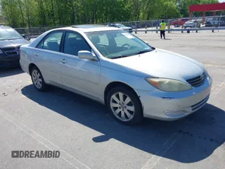 2004 Toyota Camry LE with VIN 4T1BE32K04U865944, listed as a IAAI auction lot 42066898 with 318,740 mi miles. Bid and sale history available at carsss.com. Image 1.