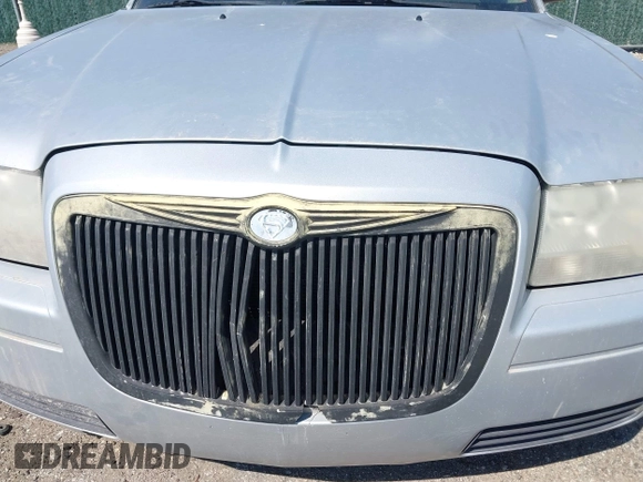 2007 Chrysler 300 with VIN 2C3KA43R67H664434, listed as a IAAI auction lot 41884172 with 238,451 mi miles. Bid and sale history available at carsss.com. Image 6.