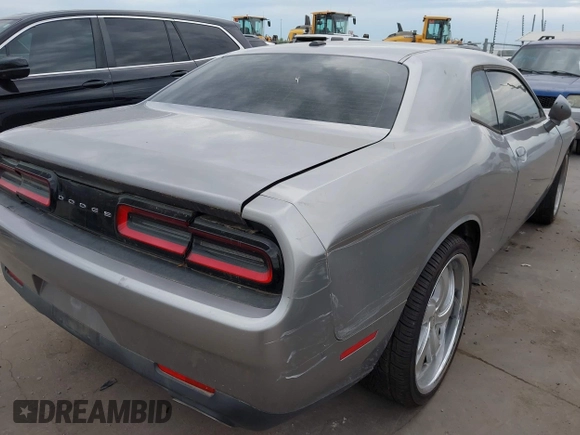 2016 Dodge Challenger SXT Plus z VIN 2C3CDZAG9GH184110, wystawiony jako IAAI lot #42463784 z przebiegiem 160 484 mil mil oraz . Historia ofert i sprzedaży dostępna na DreamBid. Obrazek 4.