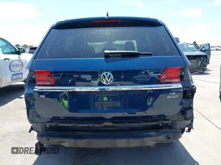2018 Volkswagen Atlas SE with VIN 1V2LR2CAXJC558200, listed as a IAAI auction lot 42297089 with 95,366 mi miles and . Bid and sale history available at DreamBid. Image 17.