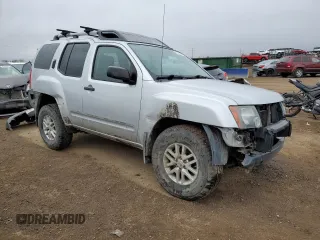 2014 Nissan Xterra X with VIN 5N1AN0NW1EN801139, listed as a Copart auction lot 49270475 with 117,619 mi miles and Salvage Title. Bid and sale history available at DreamBid. Image 4.