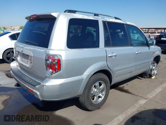 2006 Honda Pilot EX with VIN 5FNYF28436B028888, listed as a IAAI auction lot 42014594 with 219,180 mi miles and . Bid and sale history available at DreamBid. Image 4.
