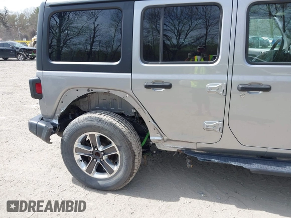 2018 Jeep Wrangler Unlimited Sahara with VIN 1C4HJXEG4JW141540, listed as a IAAI auction lot 42148402 with 43,909 mi miles and . Bid and sale history available at DreamBid. Image 6.
