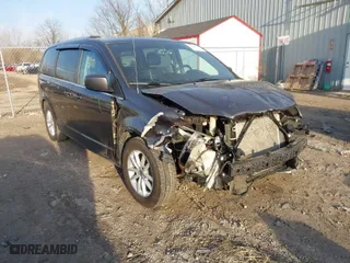 2018 Dodge Grand Caravan SXT with VIN 2C4RDGCG0JR209579, listed as a IAAI auction lot 41801457 with 104,093 mi miles. Bid and sale history available at carsss.com. Image 1.
