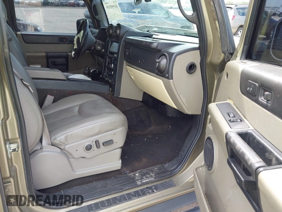 2006 Hummer H2 with VIN 5GRGN23U56H102574, listed as a IAAI auction lot 41955539 with 202,102 mi miles. Bid and sale history available at carsss.com. Image 5.