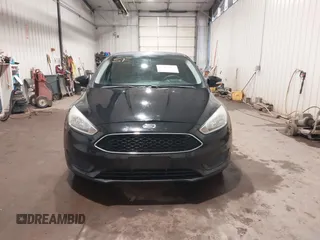 2015 Ford Focus SE with VIN 1FADP3F29FL203084, listed as a IAAI auction lot 42357973 with 99,002 mi miles and . Bid and sale history available at DreamBid. Image 12.