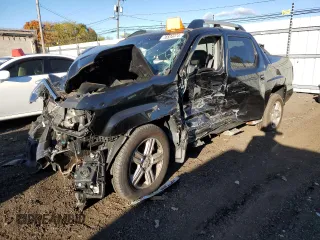 2010 Honda Ridgeline RTL with VIN 5FPYK1F58AB003793, listed as a Copart auction lot 76534474 with 0 mi miles and Salvage Title. Bid and sale history available at carsss.com. Image 1.