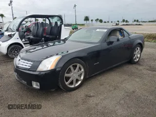 2004 Cadillac XLR z VIN 1G6YV34A445600668, wystawiony jako Copart lot #74595824 z przebiegiem Nie podano mil oraz Szkody całkowita. Historia ofert i sprzedaży dostępna na DreamBid. Obrazek 1.