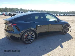 2023 Tesla Model Y Performance with VIN 7SAYGDEF2PF828973, listed as a Copart auction lot 45276585 with 15,750 mi miles and Salvage Title. Bid and sale history available at DreamBid. Image 3.