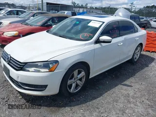 2013 Volkswagen Passat SE w/Sunroof & Nav with VIN 1VWBP7A36DC084901, listed as a IAAI auction lot 41937719 with 255,125 mi miles. Bid and sale history available at carsss.com. Image 2.
