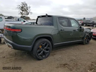 2023 Rivian R1T Adventure with VIN 7FCTGAAA2PN018657, listed as a Copart auction lot 75889434 with 14,342 mi miles and Salvage Title. Bid and sale history available at carsss.com. Image 3.