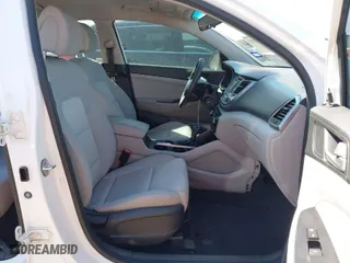 2018 Hyundai Tucson SE with VIN KM8J23A40JU669361, listed as a IAAI auction lot 41633583 with 97,884 mi miles. Bid and sale history available at carsss.com. Image 5.