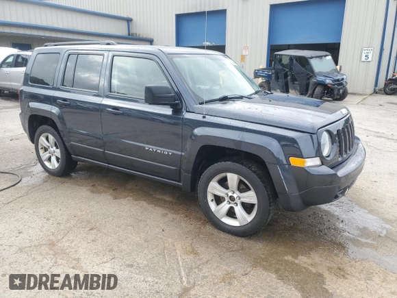 2014 Jeep Patriot Latitude with VIN 1C4NJRFB0ED649779, listed as a Copart auction lot 60444435 with 161,009 mi miles and Salvage title. Bid and sale history available at DreamBid. Image 4.