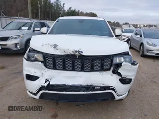 2018 Jeep Grand Cherokee Laredo E with VIN 1C4RJEAG6JC339813, listed as a IAAI auction lot 41239612 with 109,443 mi miles. Bid and sale history available at carsss.com. Image 12.