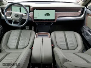 2023 Rivian R1T Adventure with VIN 7FCTGAAA2PN018657, listed as a Copart auction lot 75889434 with 14,342 mi miles and Salvage Title. Bid and sale history available at carsss.com. Image 8.