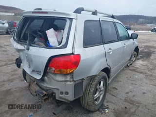 2003 Mitsubishi Outlander LS with VIN JA4LZ31G93U105062, listed as a IAAI auction lot 40978708 with 202,965 mi miles. Bid and sale history available at carsss.com. Image 4.